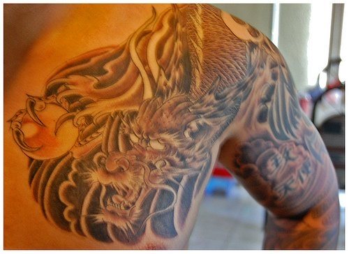 Motive für männer rücken tattoo Tattooexperte