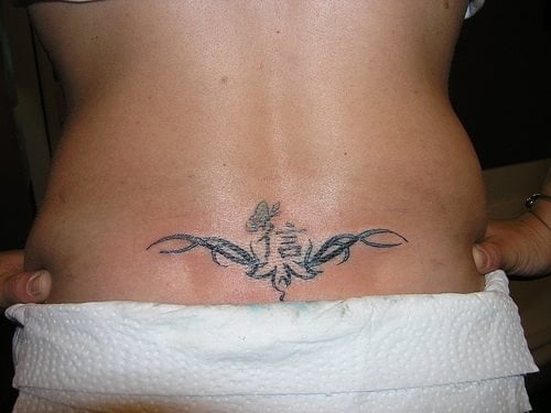 unteren rucken tattoo 574