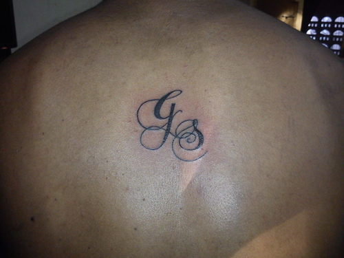 initiale tattoo 18