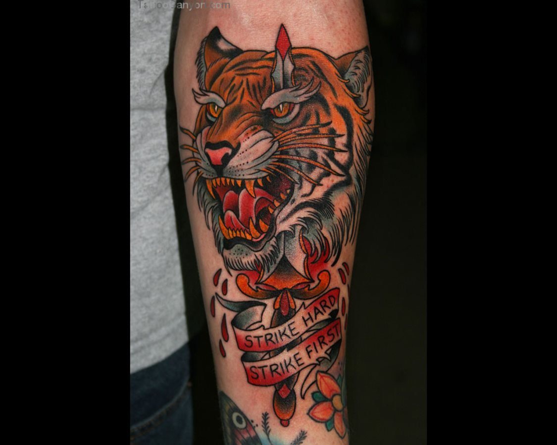 Mit tigerkopf tattoo bedeutung frau Kleiner Wolfskopf
