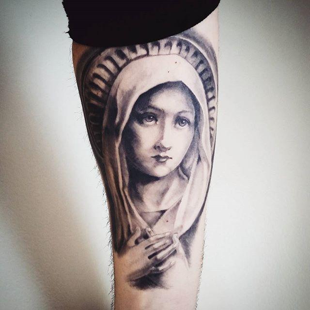 religiose motive Tattoo 69