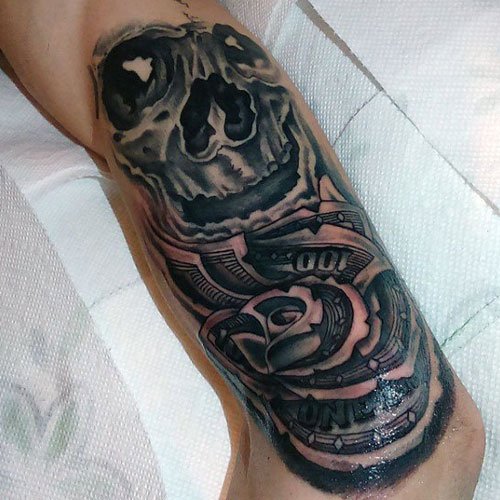 geld tattoo 23