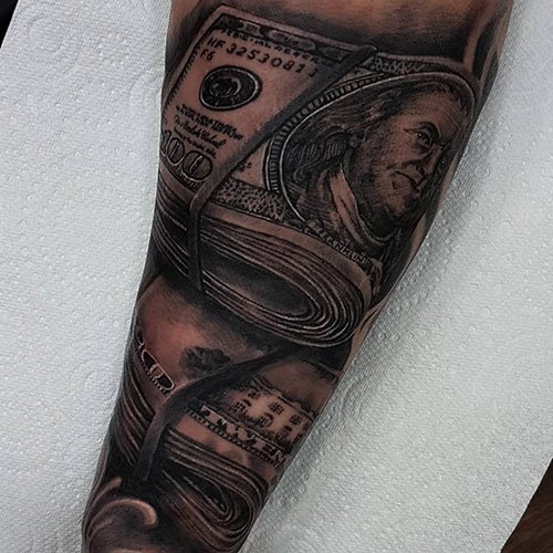 geld tattoo 78