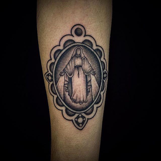 tatuaje motivo religioso 111