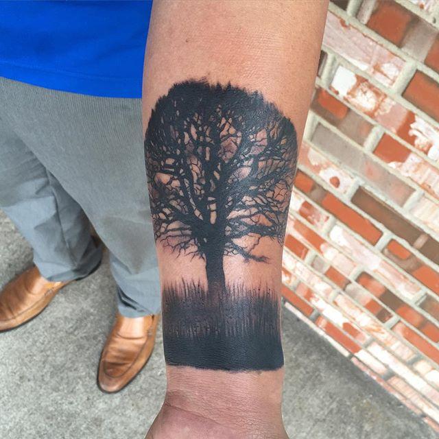 tatuaje arbol 311