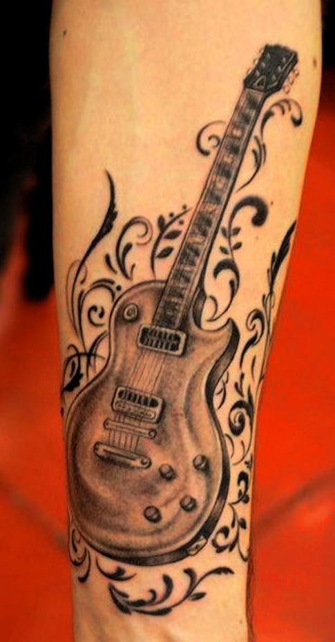 tatuaje-guitarra-brazo