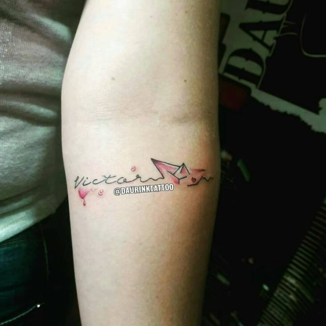 tattoo femenino con nombre 99