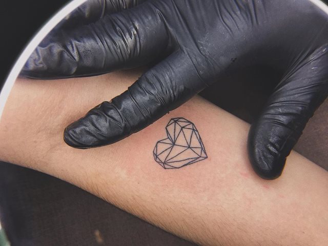 tattoo femenino estilo geometrico 33
