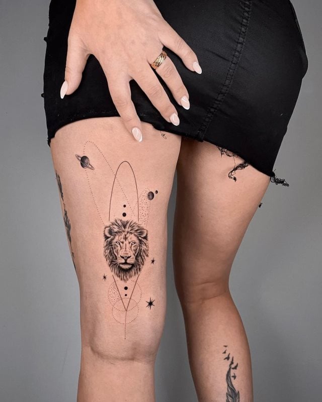 tattoo femenino leon para la pierna 09