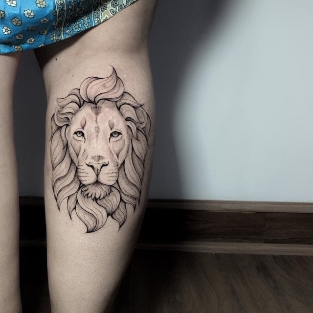 tattoo femenino leon para la pierna 10