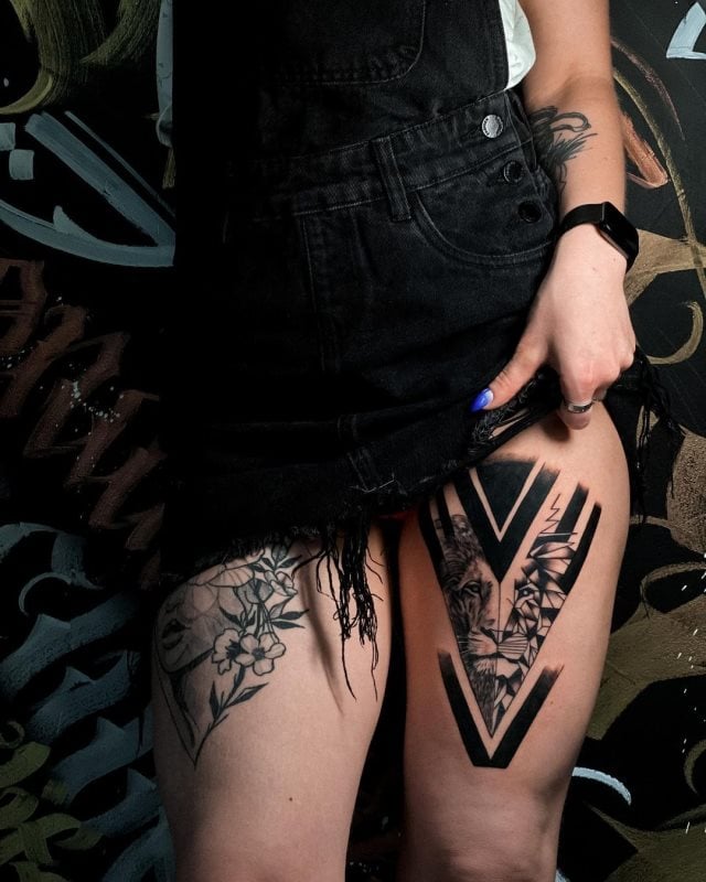 tattoo femenino leon para la pierna 13