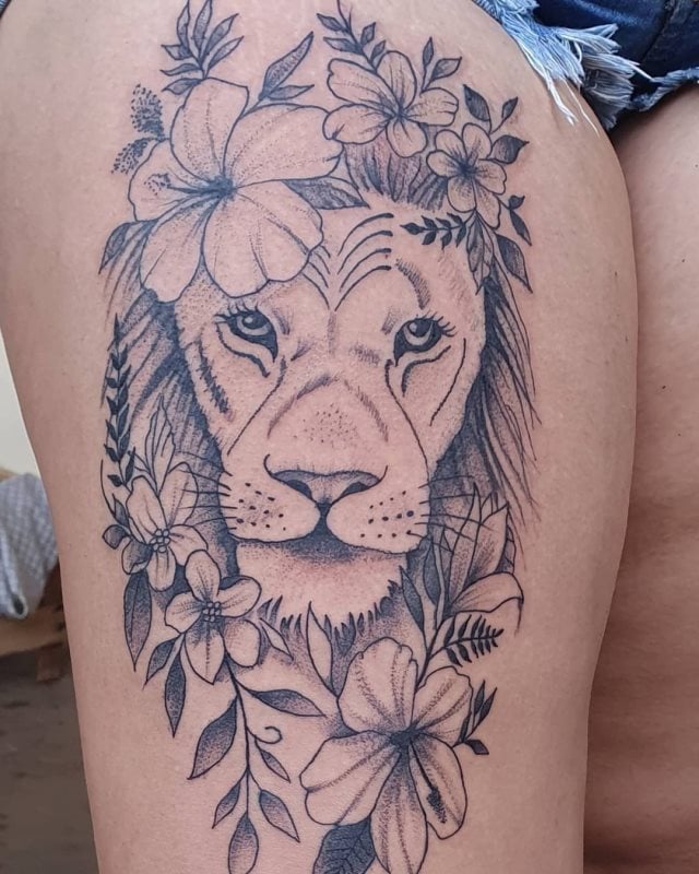 tattoo femenino leon para la pierna 15