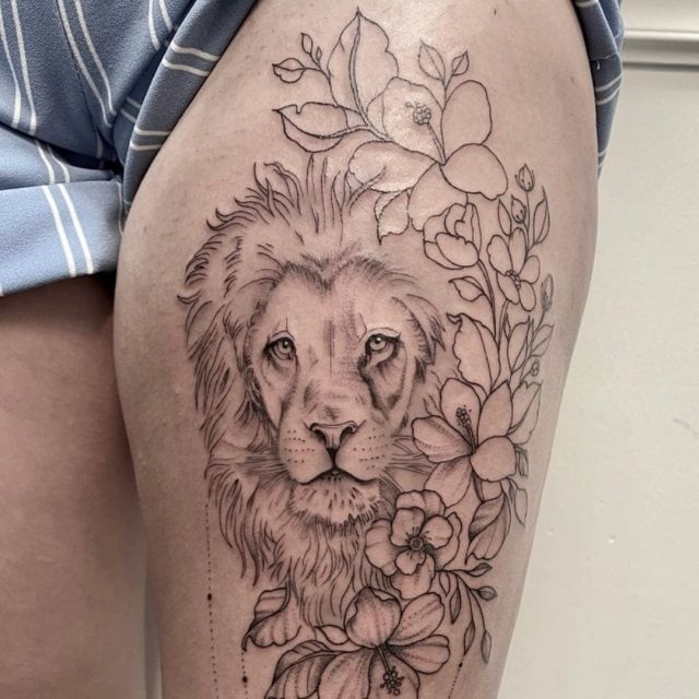 tattoo femenino leon para la pierna 20