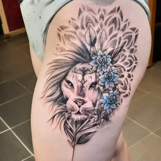 tattoo femenino leon para la pierna 34