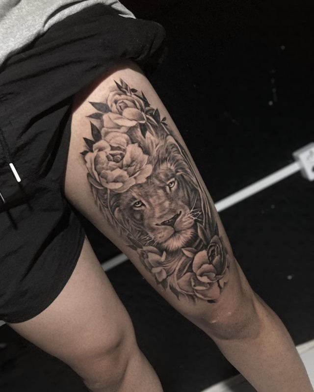 tattoo femenino leon para la pierna 39