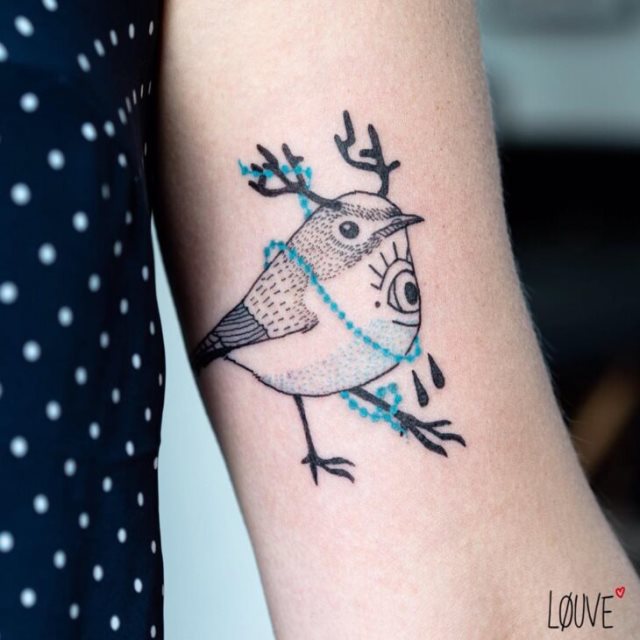 tattoo femenino pajaro 52