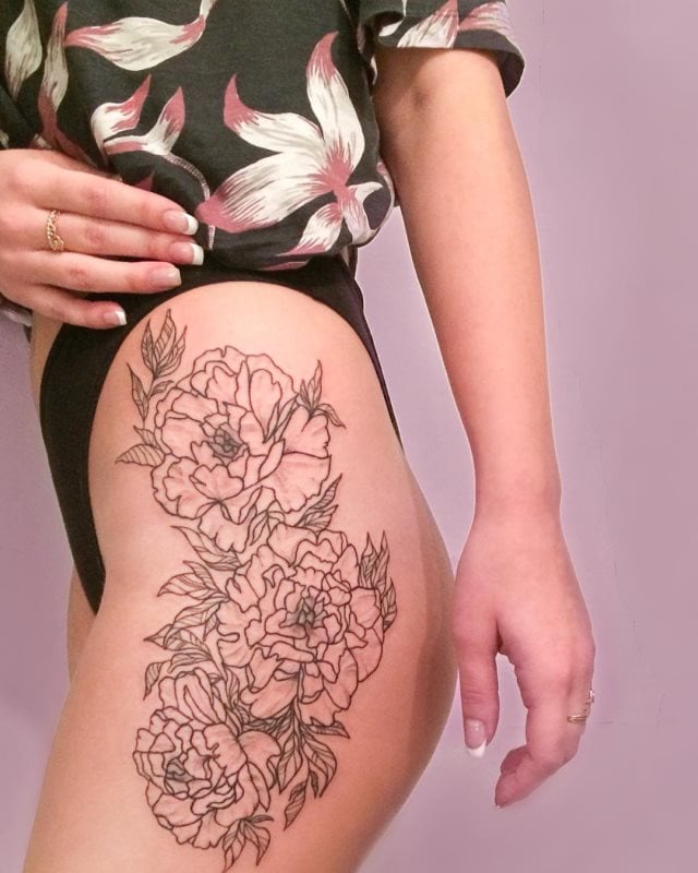 tattoo femenino para el muslo 34
