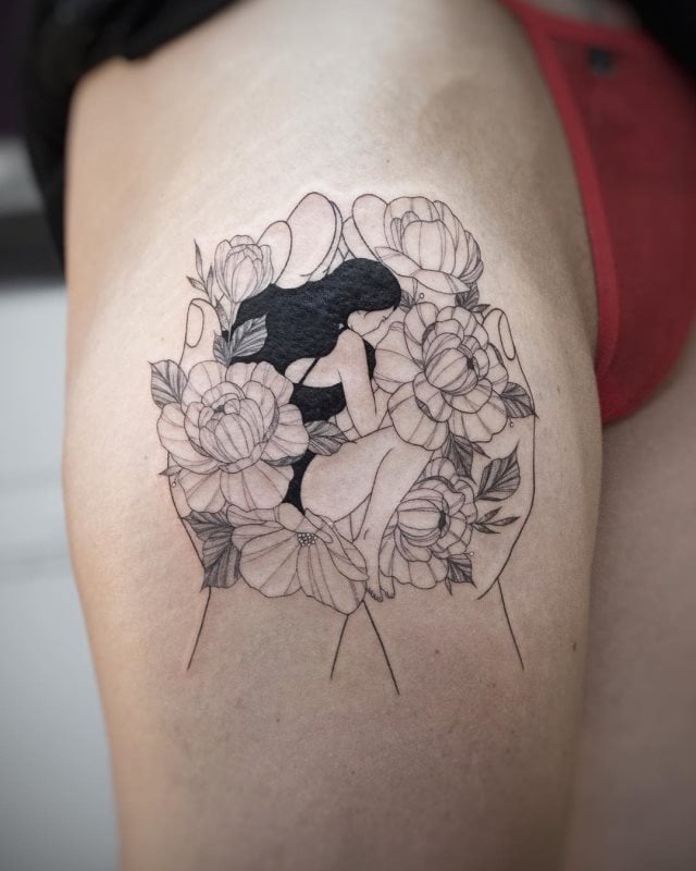 tattoo femenino para el muslo 54