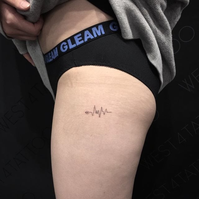 tattoo femenino para el muslo 61