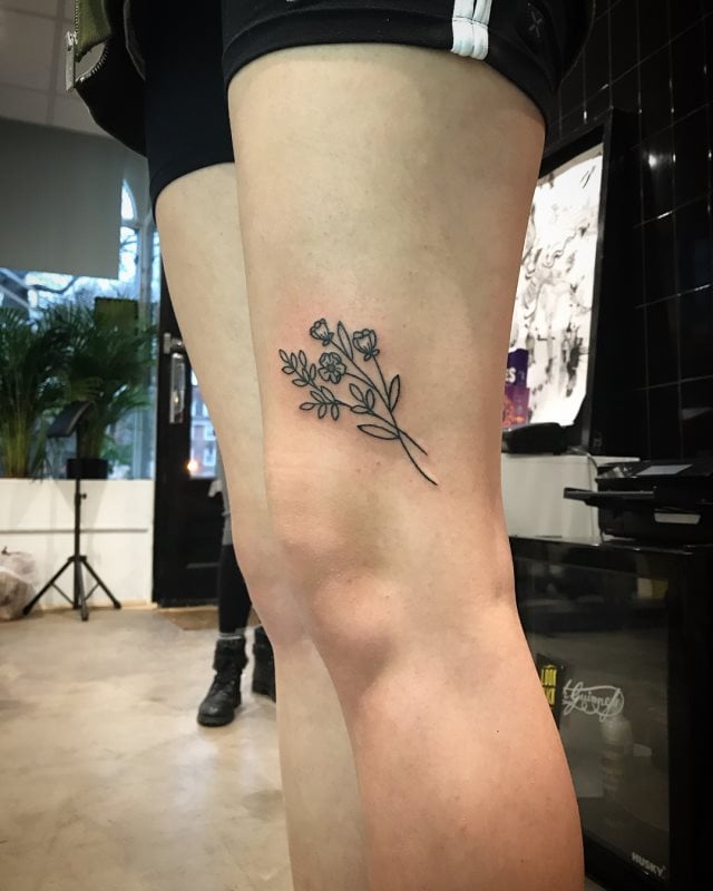 tattoo femenino para el muslo 83