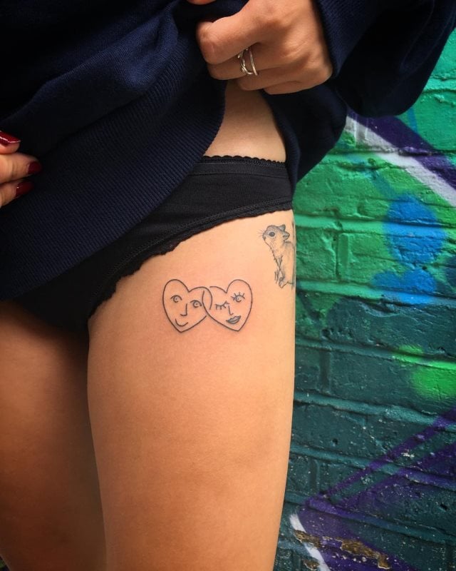 tattoo femenino para el muslo 84