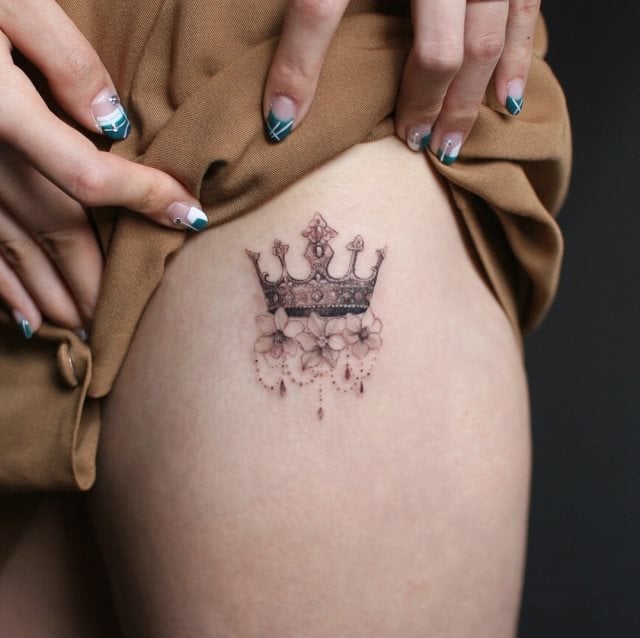 tattoo femenino para el muslo 87