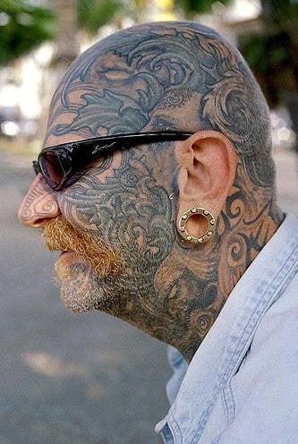 tatuaje cara 525