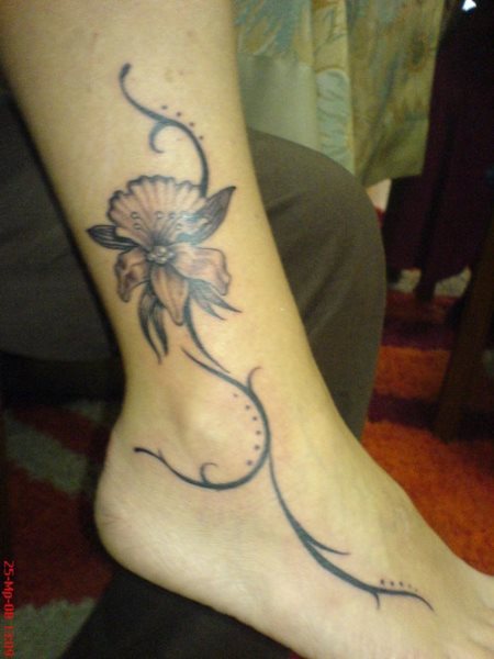 tatuaje flor orquidea 1009