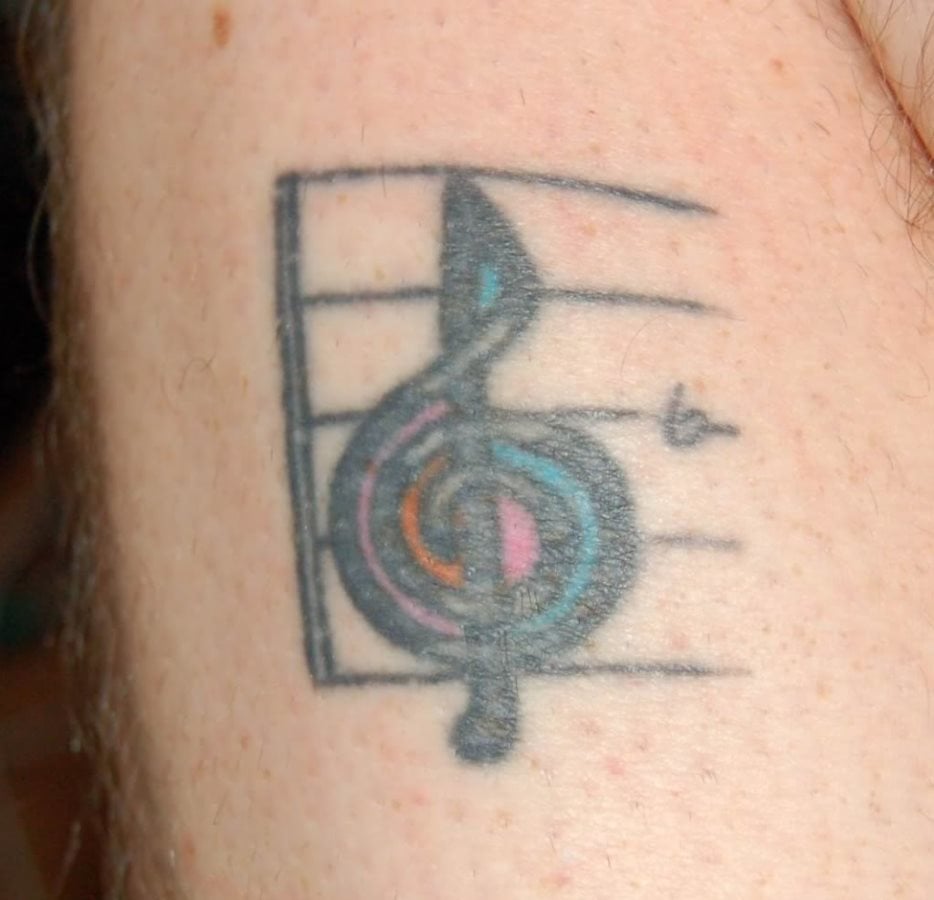 tatuaje clave de sol 23