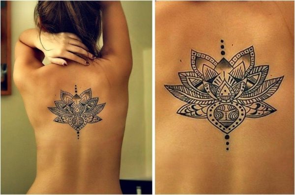 Con un marcado estilo budista, encontramos este precioso tatuaje de una flor de loto en la parte central de la espalda de esta chica