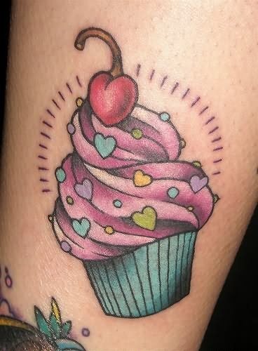 Diseo de un cup cake con una cereza en la parte superior del mismo