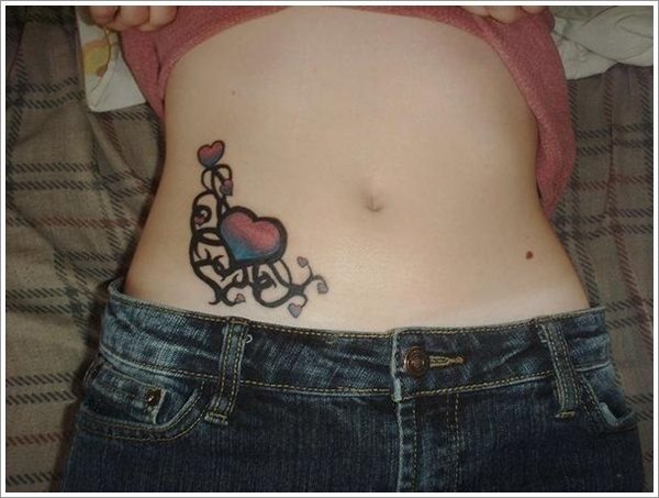 Corazn nuevamente tatuado en el abdomen