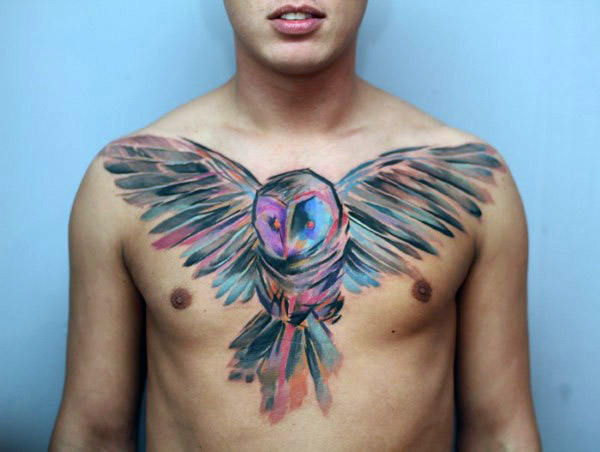 impresionante tatuaje buho hombre 12