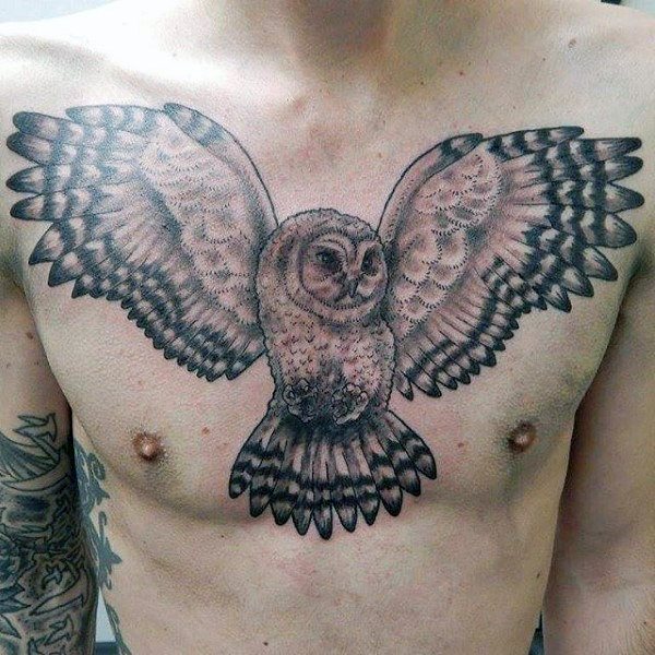 impresionante tatuaje buho hombre 14