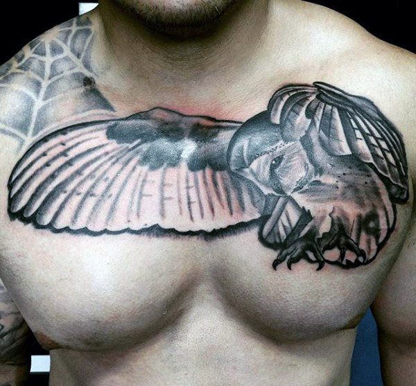 impresionante tatuaje buho hombre 18