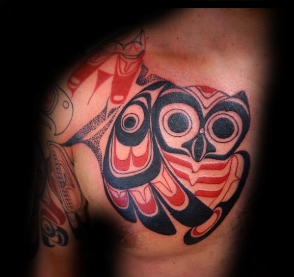 tatuaje buho tribal para hombre 11