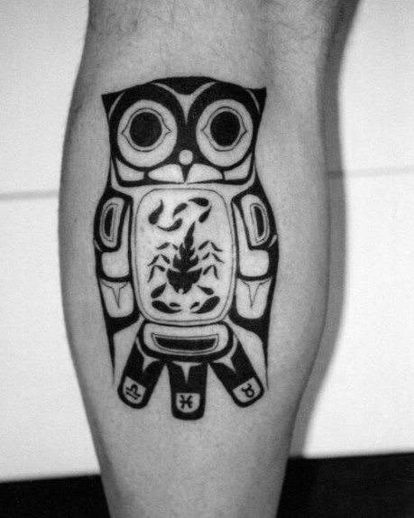 tatuaje buho tribal para hombre 13