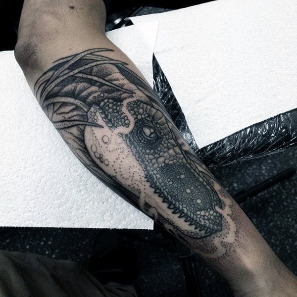 tatuaje dinosaurio para hombre 16