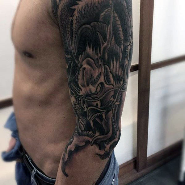 tatuaje dragon brazo para hombre 35