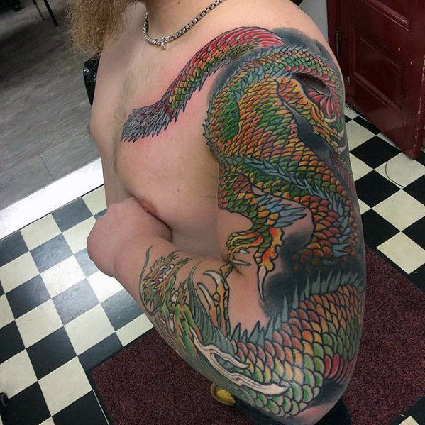 tatuaje dragon brazo para hombre 59