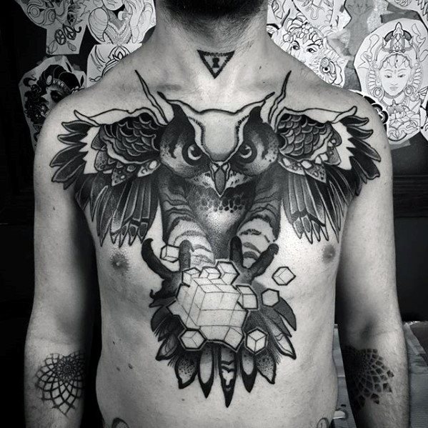 tatuaje geometrico buho para hombre 29