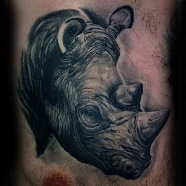 tatuaje rinoceronte para hombre 17