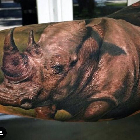 tatuaje rinoceronte para hombre 49