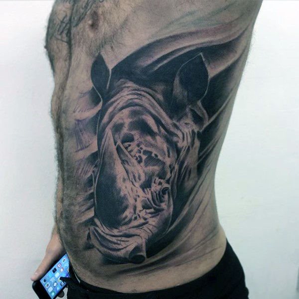 tatuaje rinoceronte para hombre 63