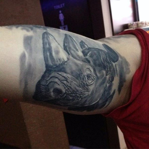 tatuaje rinoceronte para hombre 76