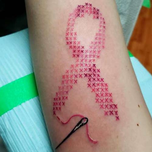 tatuaje lazo cancer 98