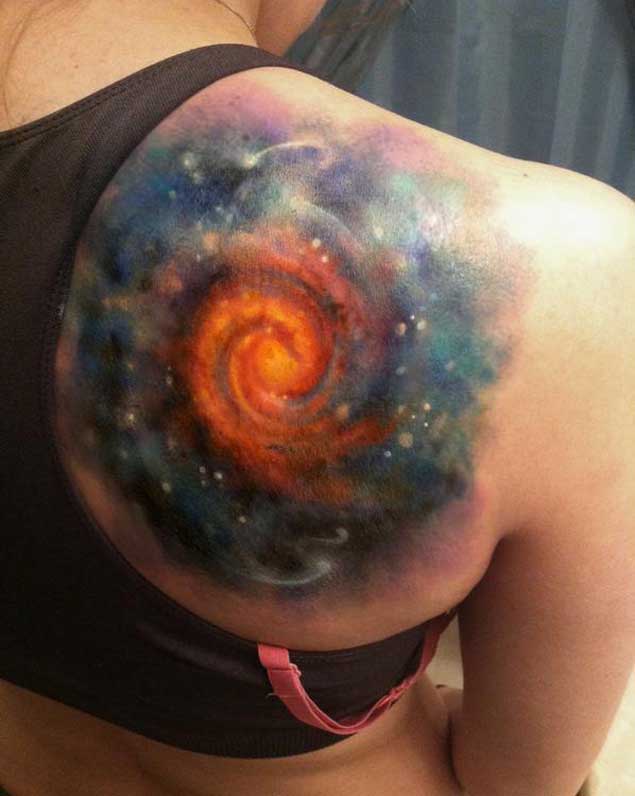tatuaje cosmico espacio 31