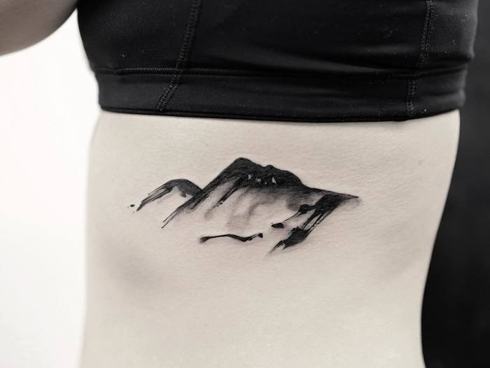 tatuaje montanas 106