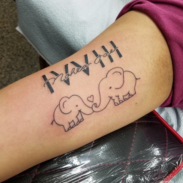 tatuaje nombre hijo 20