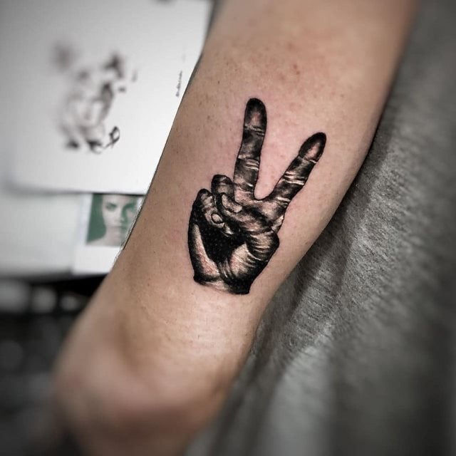 tattoo simbolo paz 08
